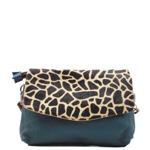 Handmade recycled leather crossbody bag featuring red, yellow and green tones, a reversible animal print flap and adjustable shoulder strap