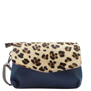 Handmade recycled leather crossbody bag featuring blue, purple and orange tones, a reversible animal print flap and adjustable shoulder strap