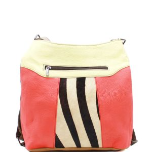 Handcrafted convertible shoulder bag and backpack made from recycled leather in yellow and red shades with animal print accents