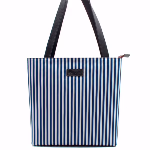 Women’s recycled leather and canvas handbag in azure blue tones for everyday use