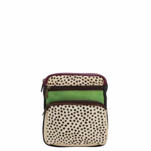 Women’s recycled leather belt bag in green and black tones with animal print and adjustable waist strap