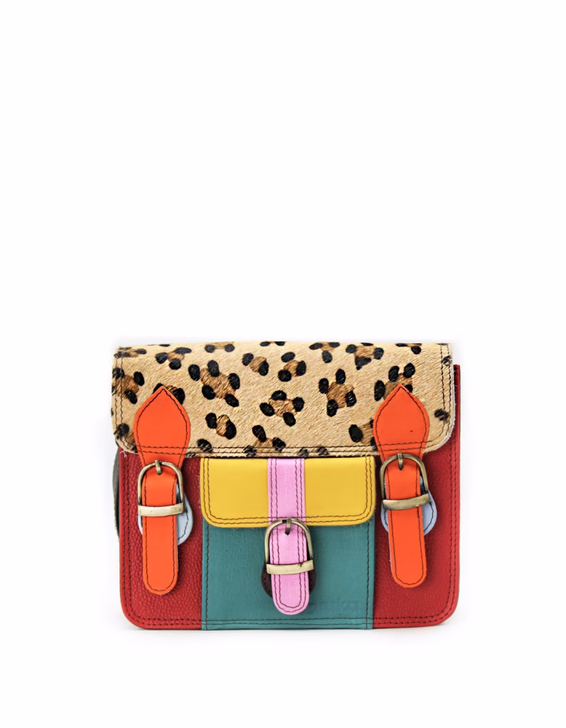 Women’s recycled leather messenger bag in Red and Blue tones with adjustable leather shoulder strap