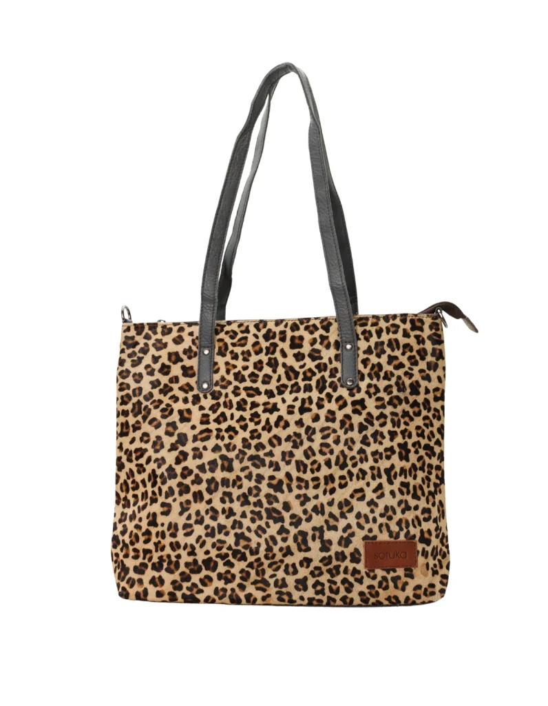 Women’s recycled leather tote shoulder bag with reversible animal print design and adjustable crossbody strap