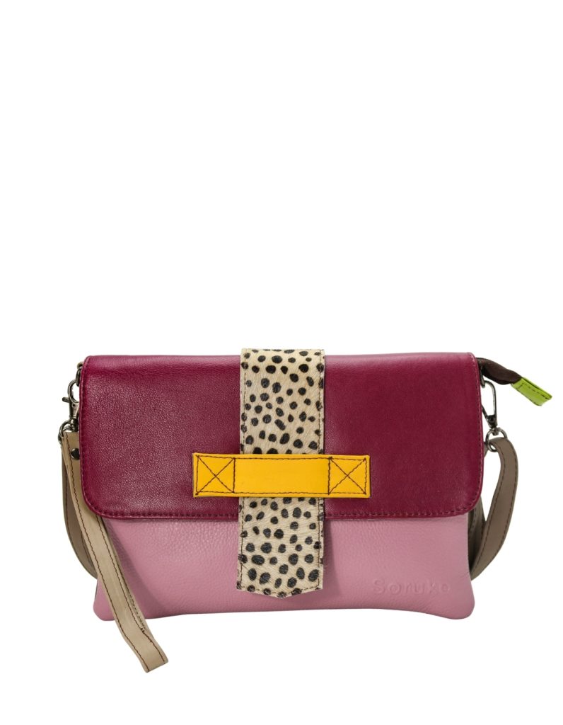 Women’s recycled leather crossbody bag in Pink and Purple with reversible design