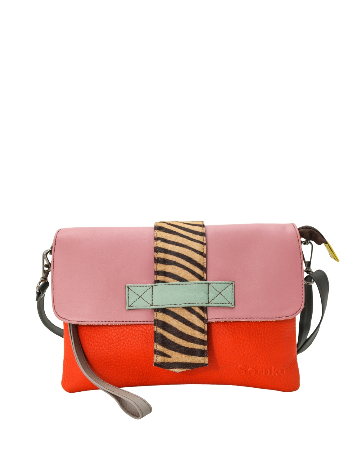 Women’s recycled leather crossbody bag in Red and Purple with reversible design