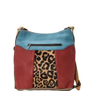 Handmade recycled leather convertible backpack in red and blue tones with animal print and adjustable strap