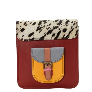 Women’s recycled leather backpack in Red and Orange tones with animal print flap and convertible crossbody strap