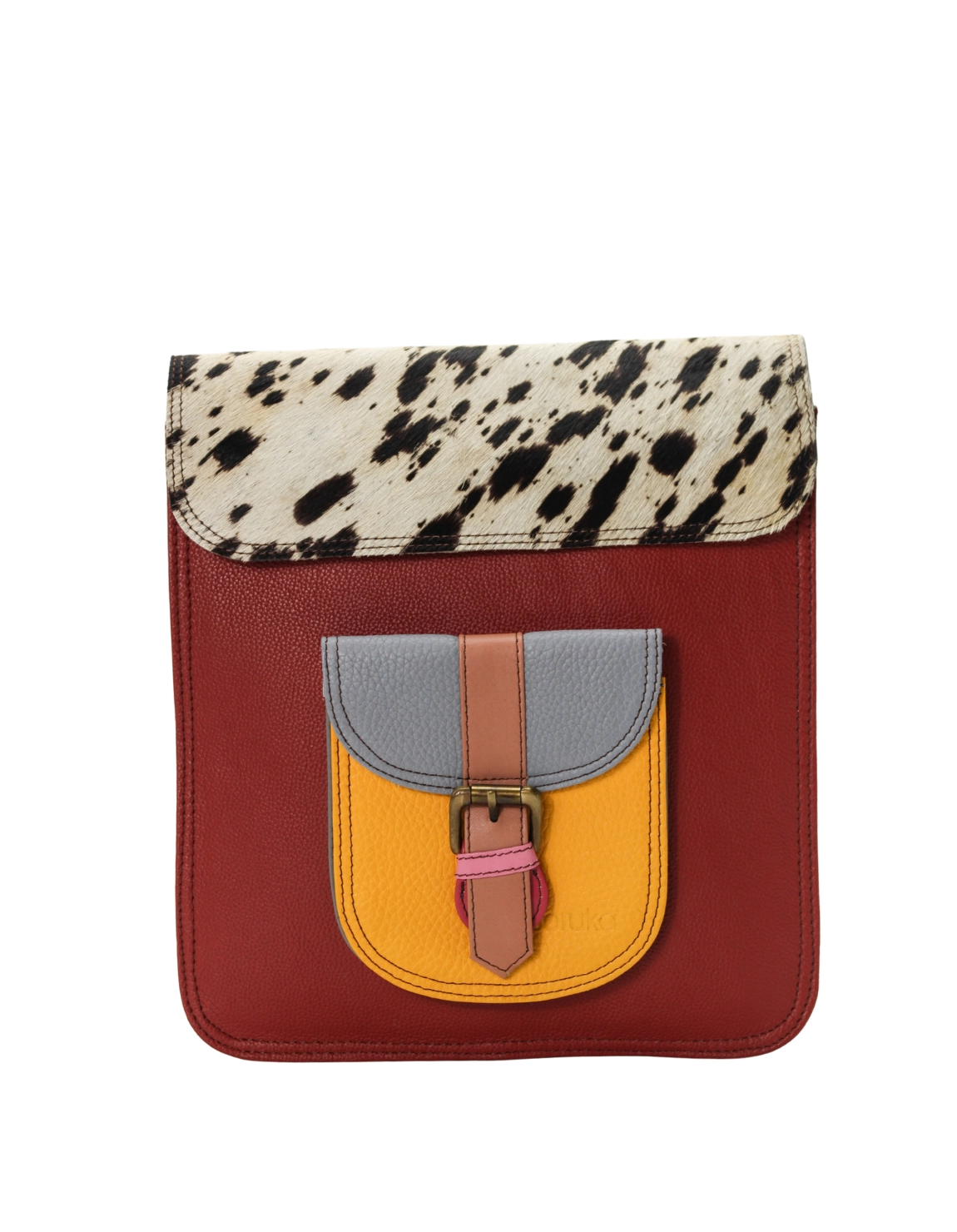 Women’s recycled leather backpack in Red and Orange tones with animal print flap and convertible crossbody strap