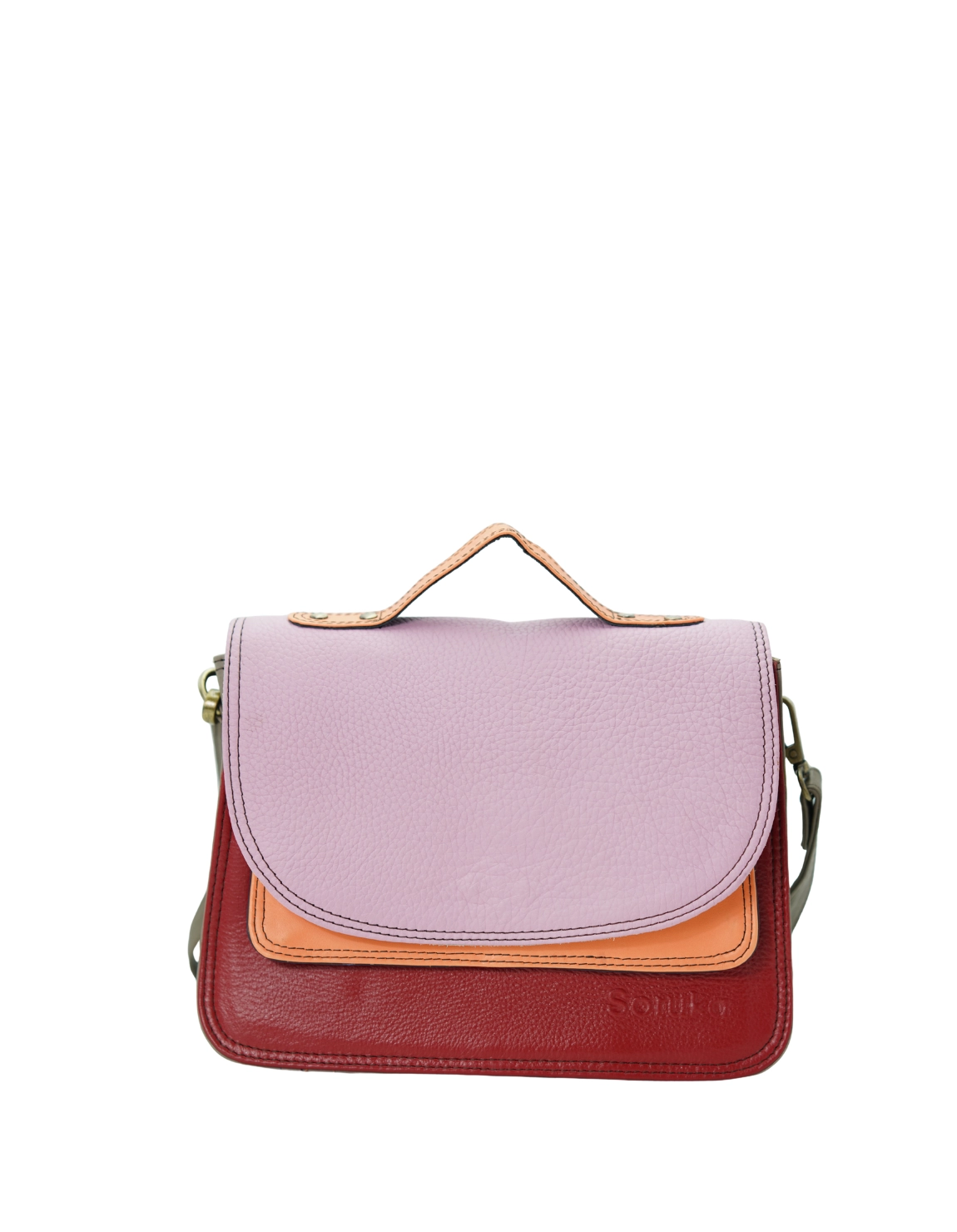 Handmade recycled leather saddle bag in Red and Pink tones with animal print flap