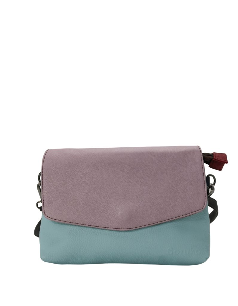 Women’s recycled leather reversible crossbody bag in Light Pink