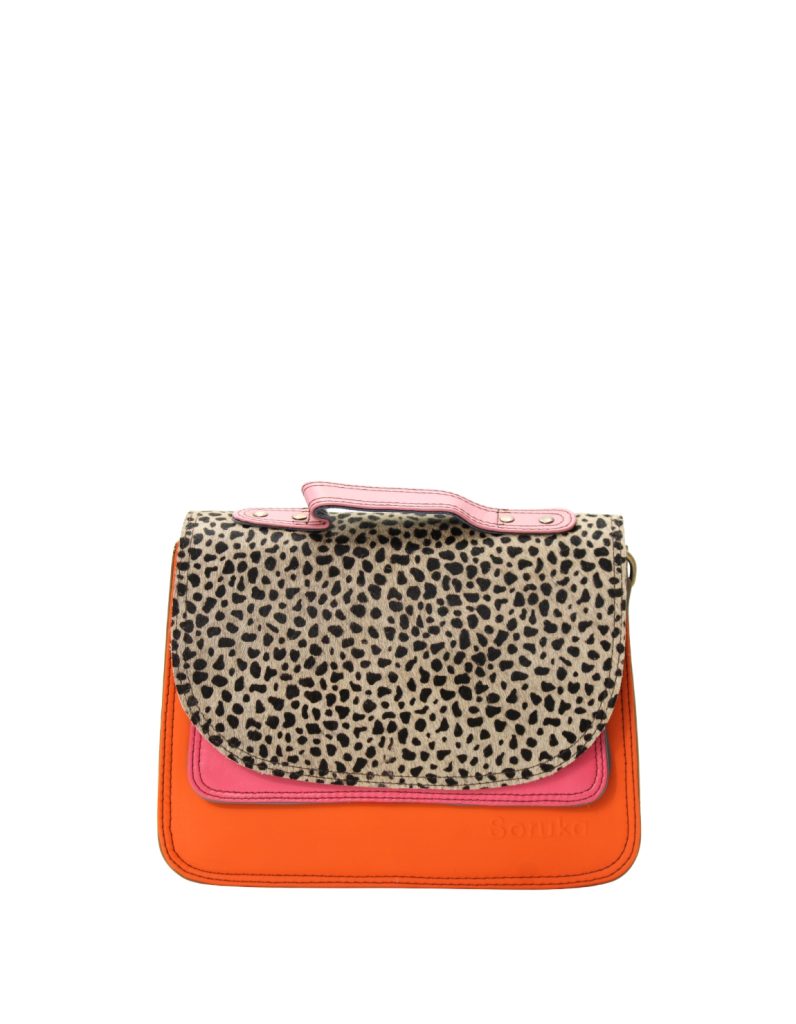 Handmade recycled leather saddle bag in Pink and Orange tones with animal print flap