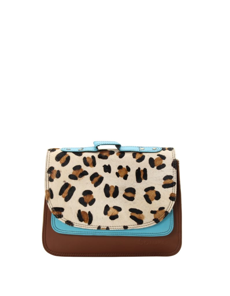 Handmade recycled leather saddle bag in Brown and Blue tones with animal print flap