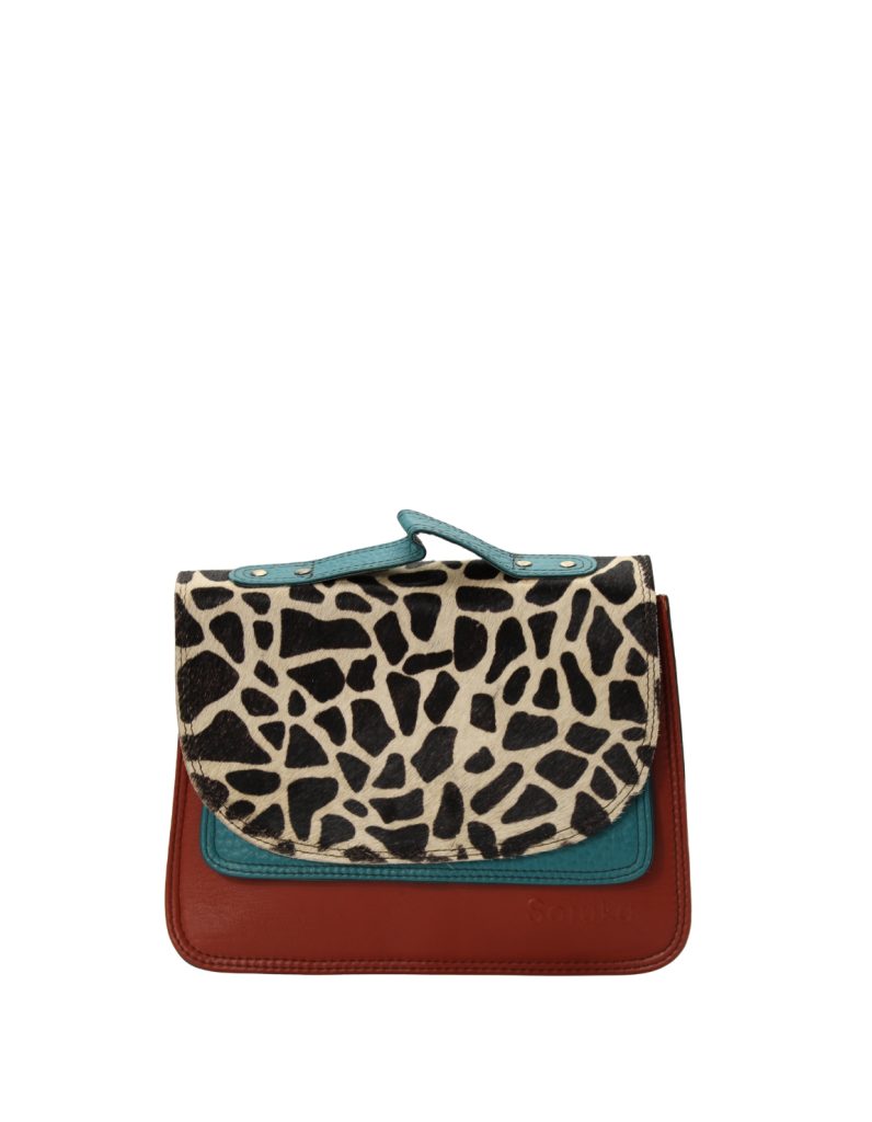 Handmade recycled leather saddle bag in Red and Blue tones with animal print flap