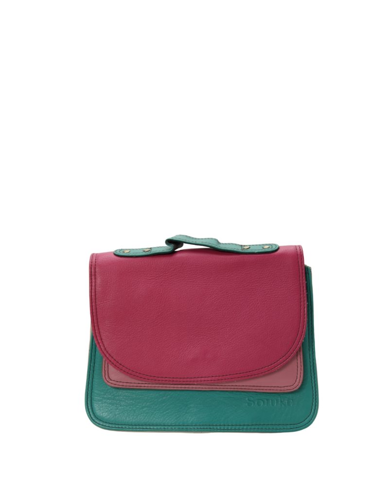 Handmade recycled leather saddle bag in Blue and Pink tones with animal print flap